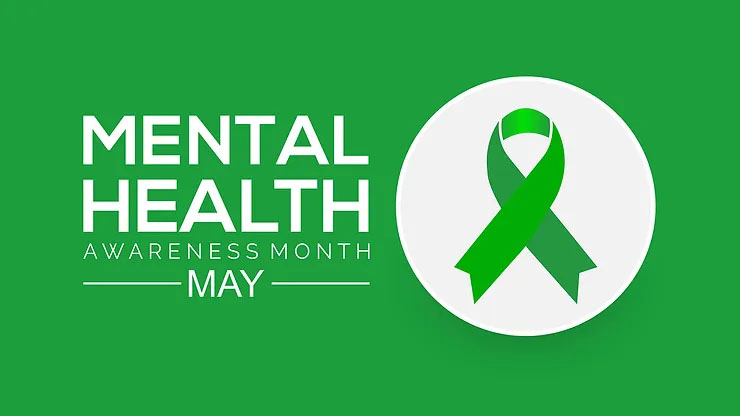 The phrase mental health awareness month and the word may appear in white beside a green ribbon that is surrounded by a white circle and green background.