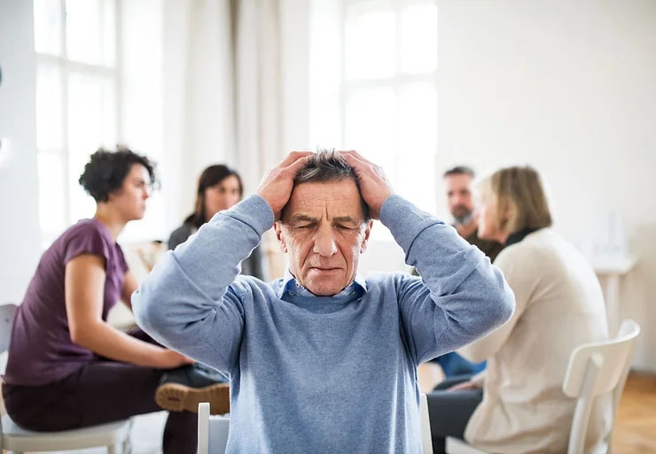 An old man dealing with stress.
